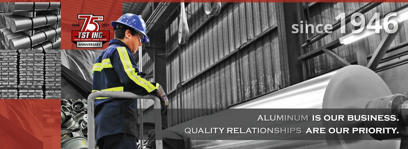 Man standing above aluminum tandem with TST logo and alpase, standard, timco, and tandem.