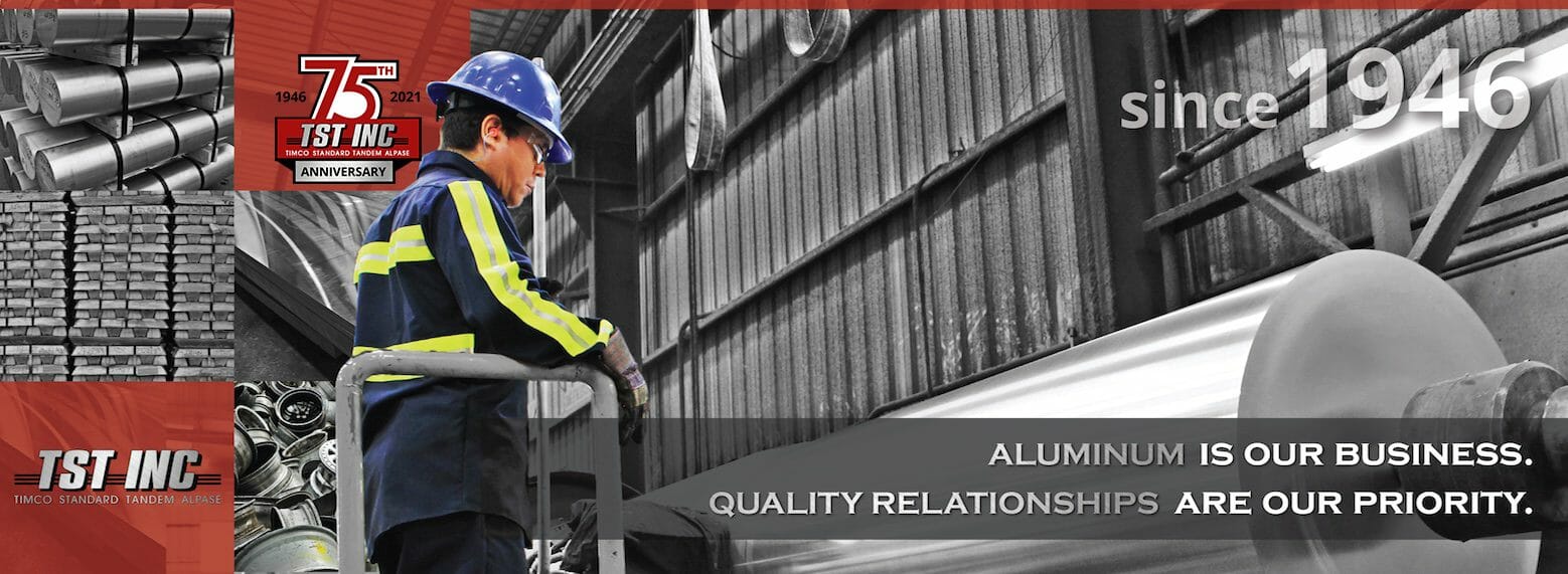 Man standing above aluminum tandem with TST logo and alpase, standard, timco, and tandem.